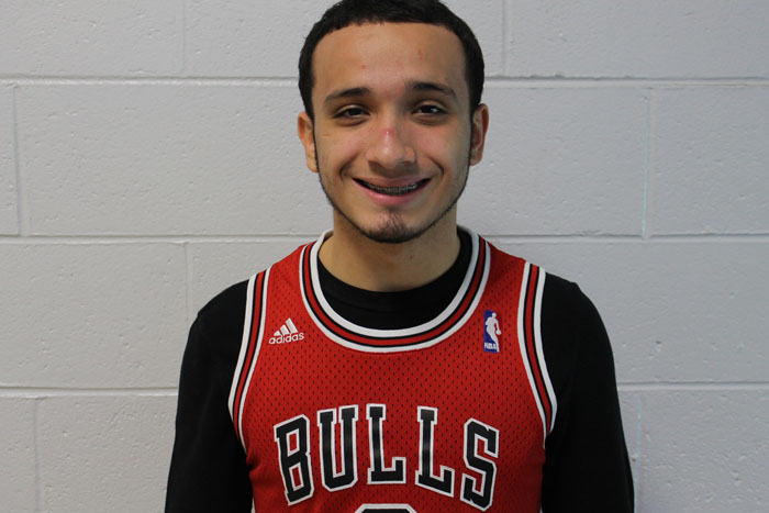 Senior Anthony Martinez wearing his Bulls jersey proud in the halls.